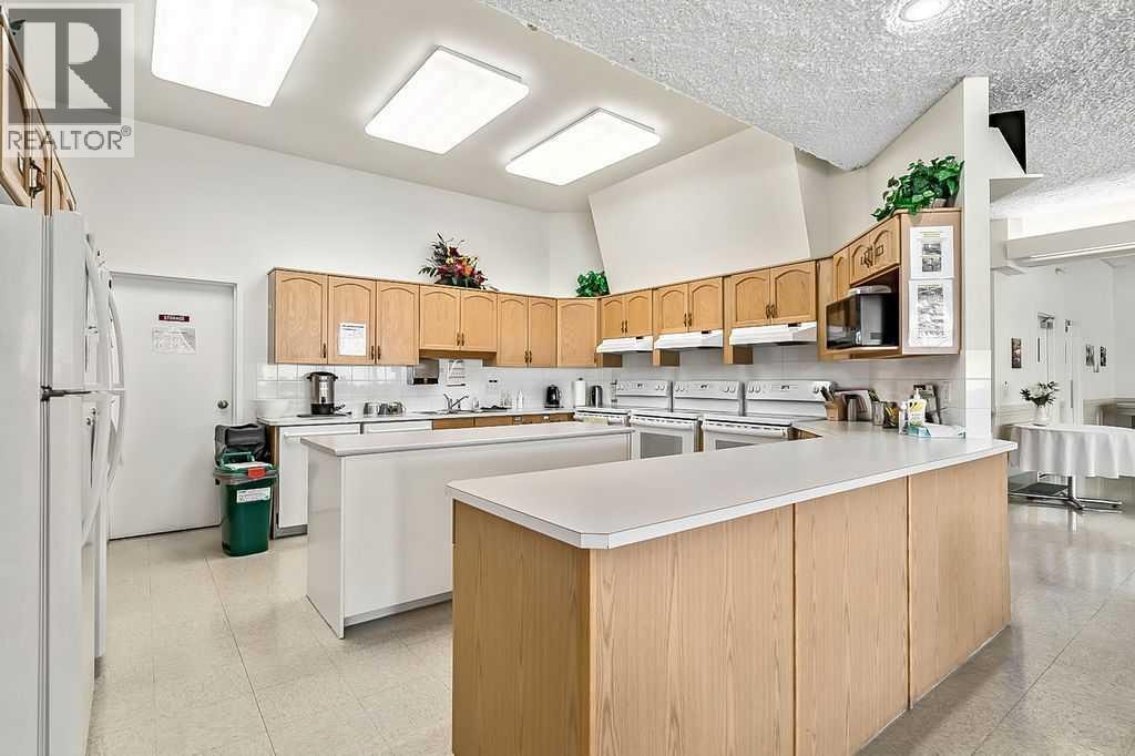 1103, 1103 Hawksbrow Point NW — photo 39