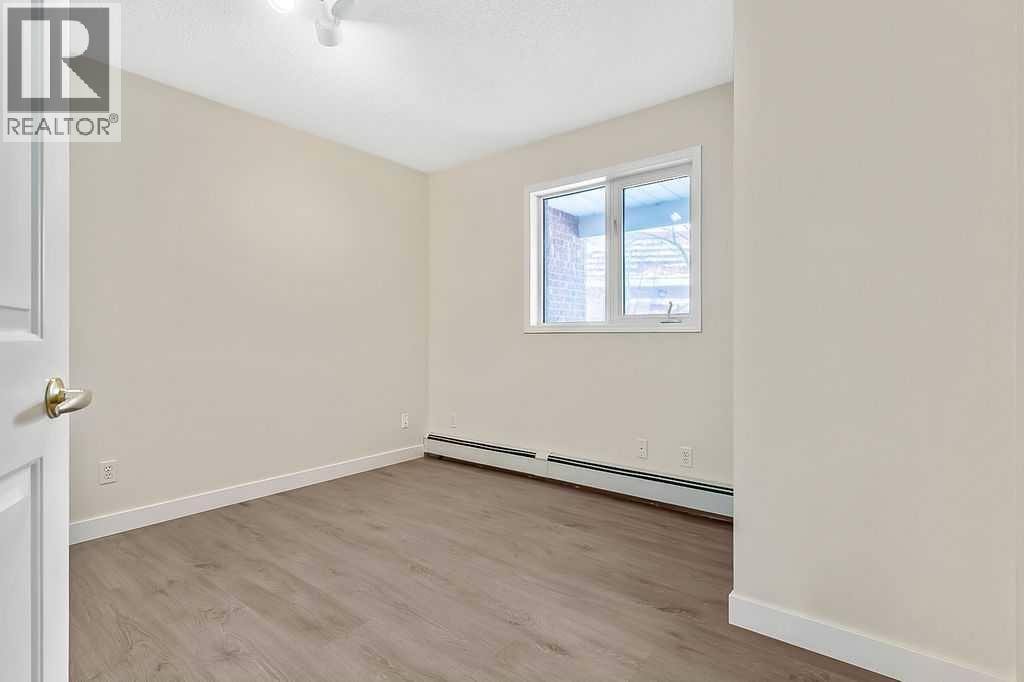 1103, 1103 Hawksbrow Point NW — photo 15