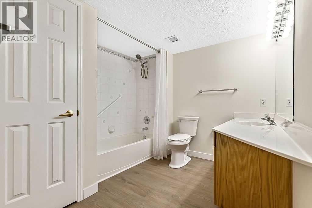 1103, 1103 Hawksbrow Point NW — photo 17