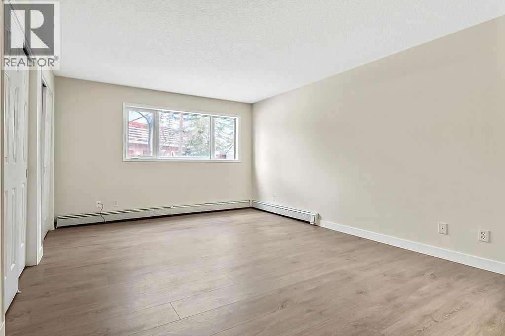 1103, 1103 Hawksbrow Point NW — photo 21