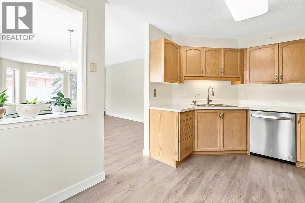 1103, 1103 Hawksbrow Point NW — photo 10