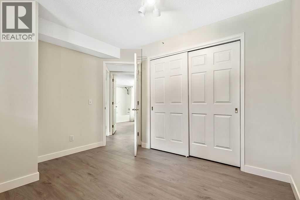1103, 1103 Hawksbrow Point NW — photo 16