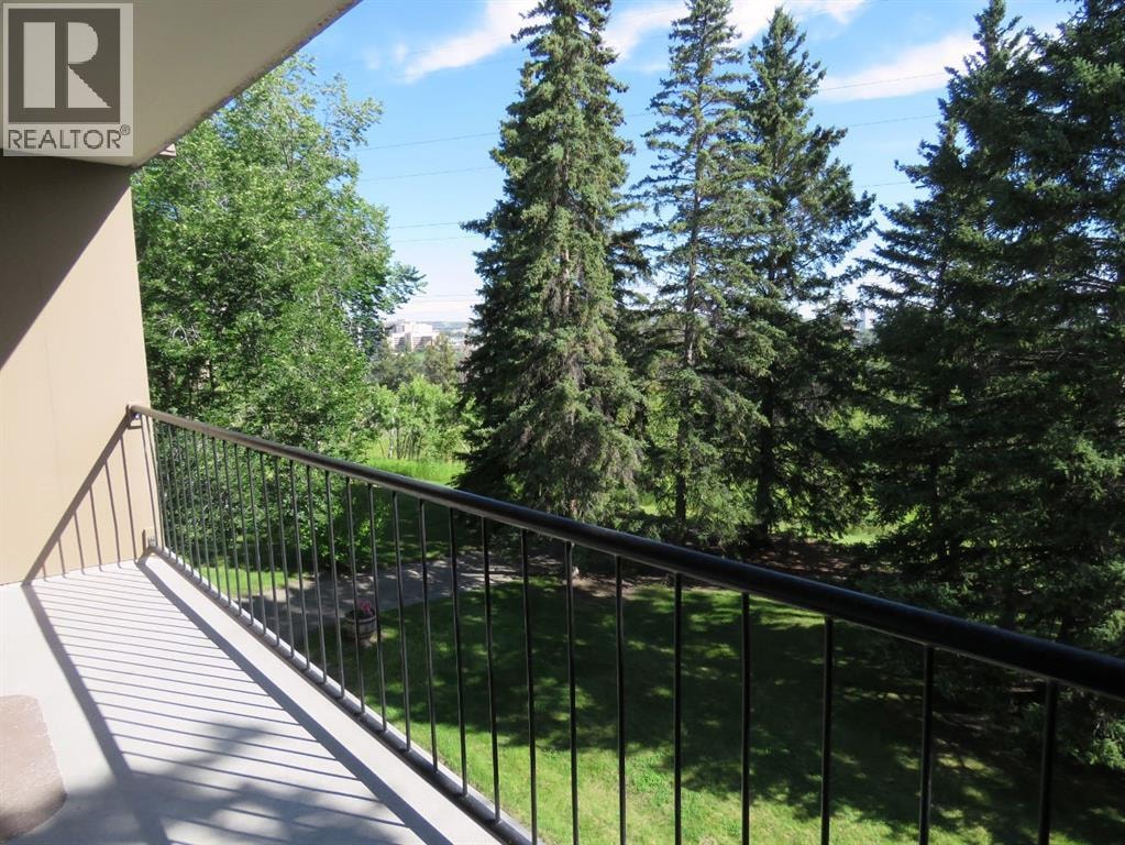 204, 328 Cedar Crescent SW — photo 5