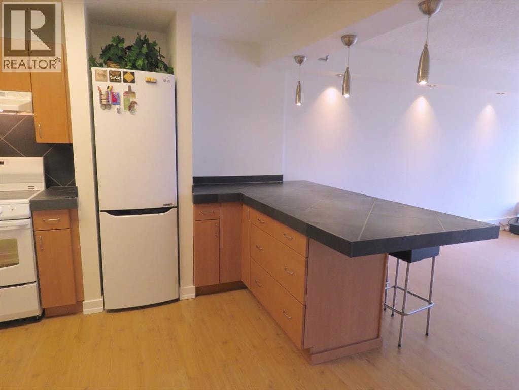 204, 328 Cedar Crescent SW — photo 12