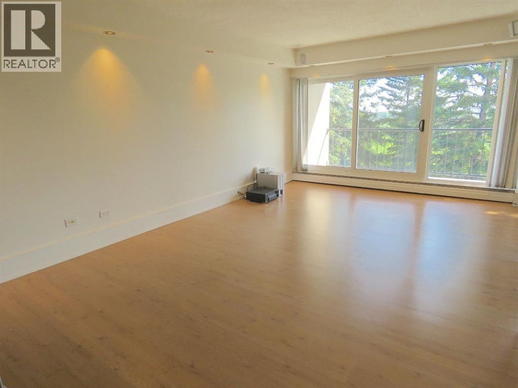 204, 328 Cedar Crescent SW — photo 8