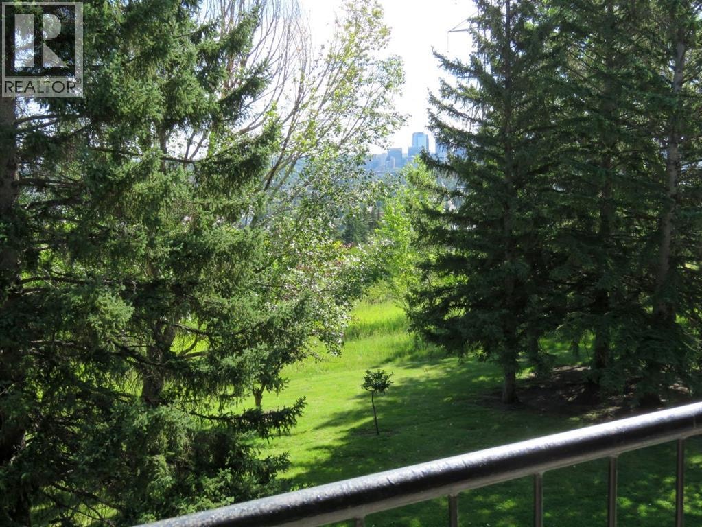 204, 328 Cedar Crescent SW — photo 7