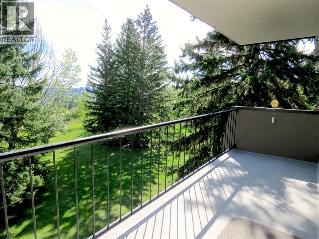 204, 328 Cedar Crescent SW — photo 6