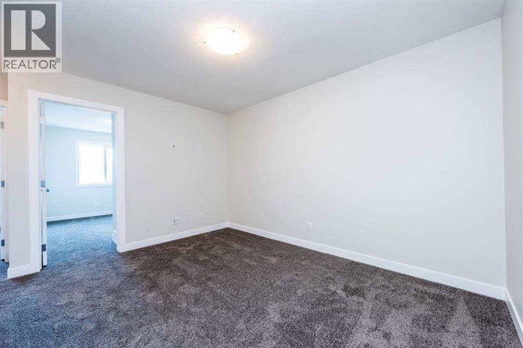 671 Wolf Willow Boulevard SE — photo 26