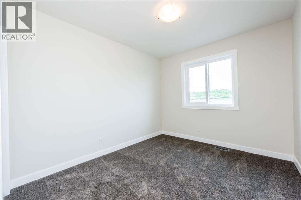 671 Wolf Willow Boulevard SE — photo 30