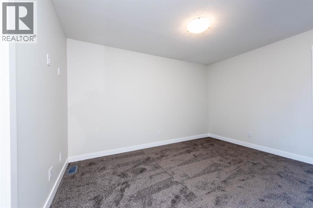 671 Wolf Willow Boulevard SE — photo 27