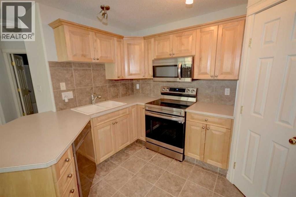 1207, 7451 Springbank Boulevard SW — photo 6