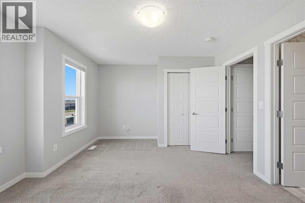 1322, 7451 Falconridge Boulevard NE — photo 26