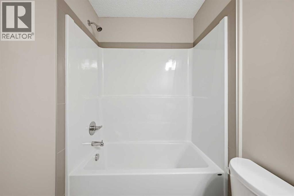 1322, 7451 Falconridge Boulevard NE — photo 21