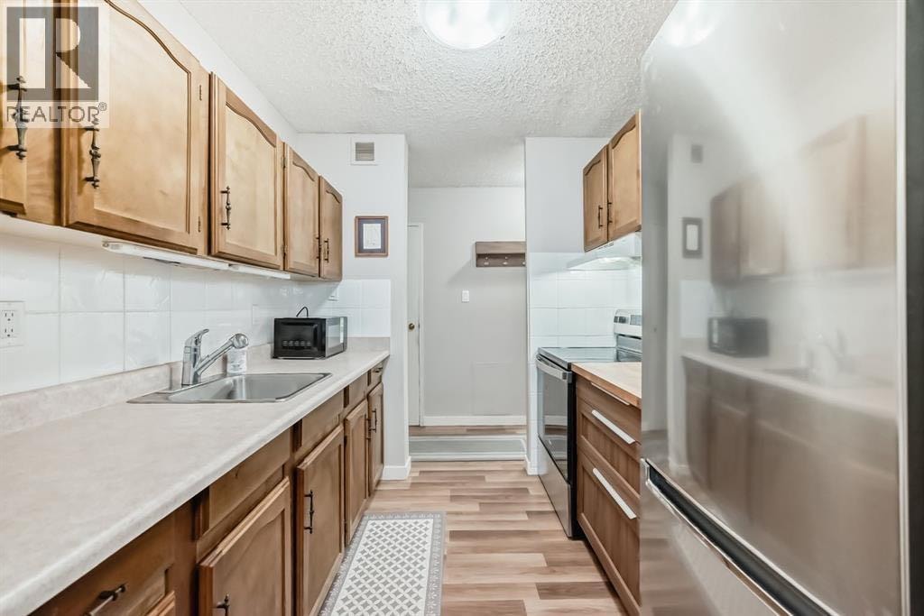 382, 8948 Elbow Drive SW — photo 5