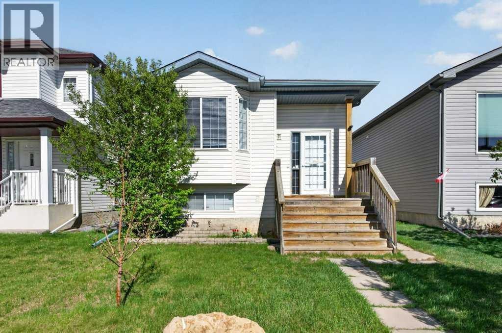 173 Martin Crossing Crescent NE — photo 1