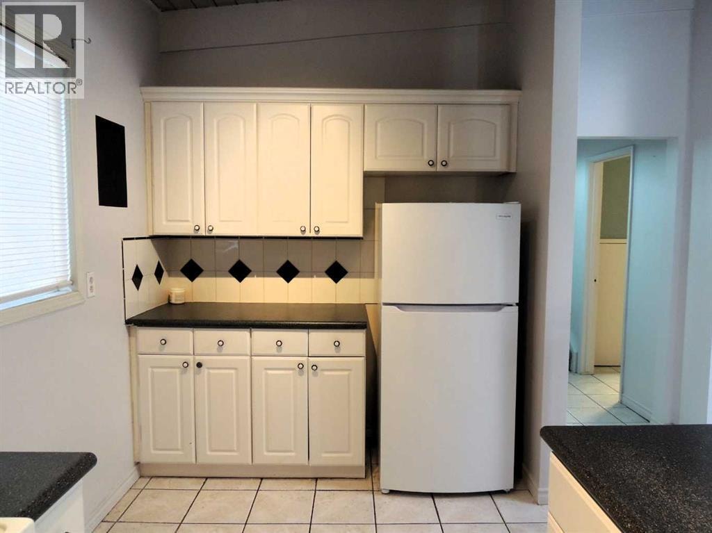 2713 Canmore Road NW — photo 16