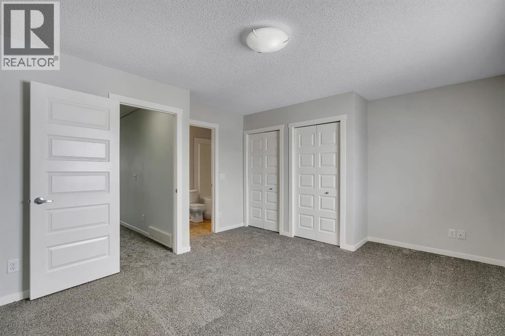 406 Mckenzie Towne Close SE — photo 16