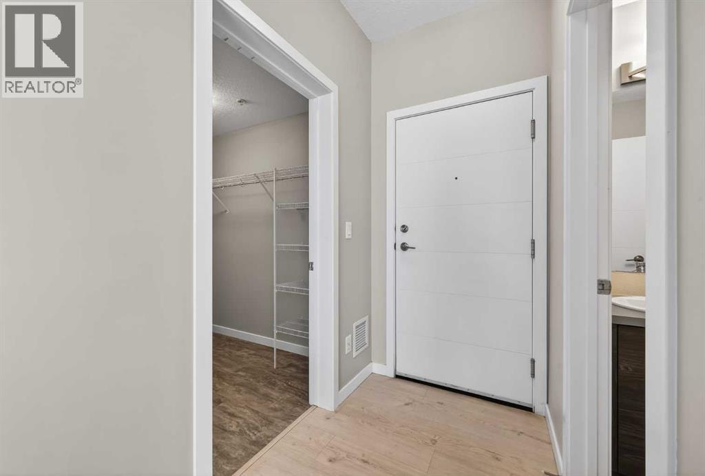 407, 122 Mahogany Centre SE — photo 3