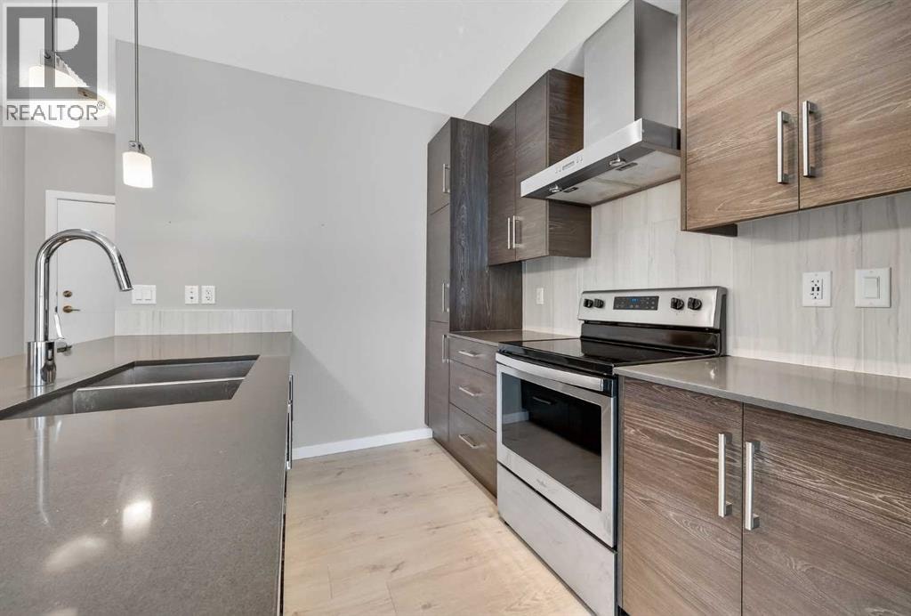 407, 122 Mahogany Centre SE — photo 5
