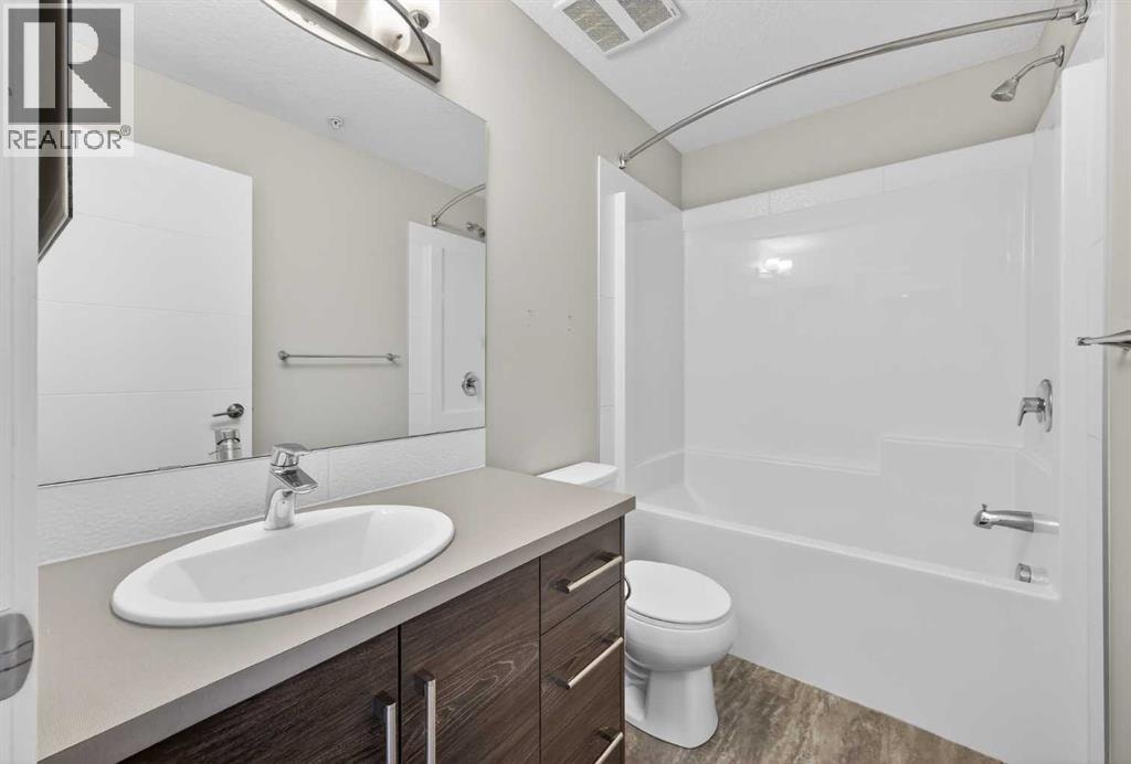 407, 122 Mahogany Centre SE — photo 19
