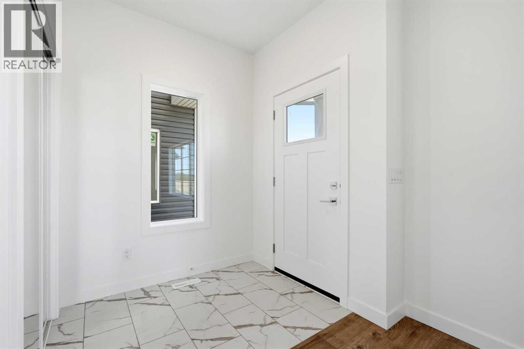 9993 Huxbury Drive NE — photo 2
