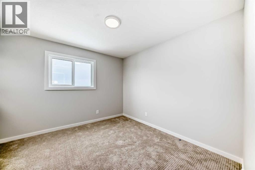 203 Langwell Common SE — photo 36