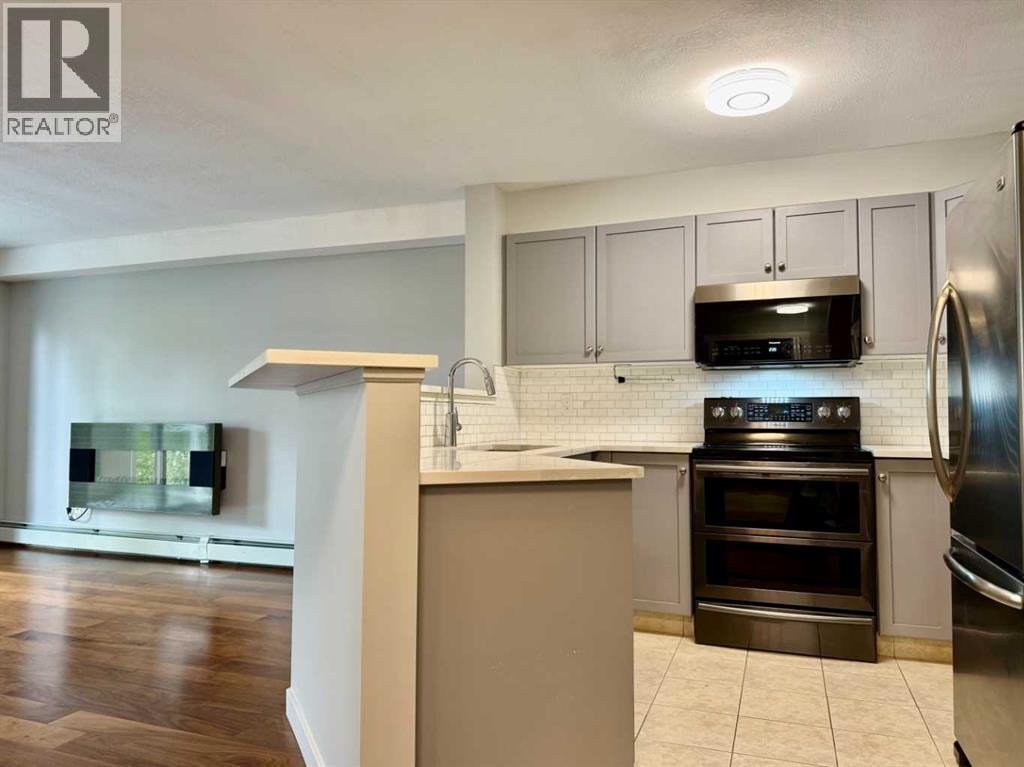 1212, 2518 Fish Creek Boulevard SW — photo 4