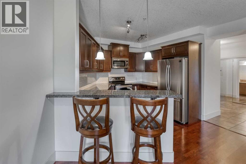 213, 77 George Fox Trail W — photo 22