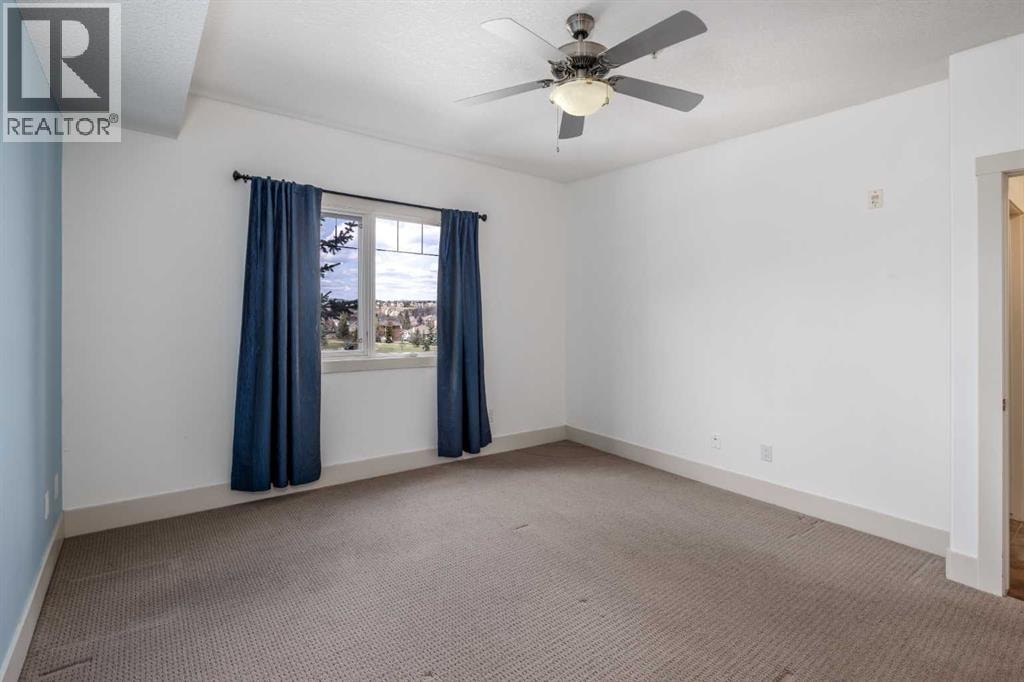 213, 77 George Fox Trail W — photo 16
