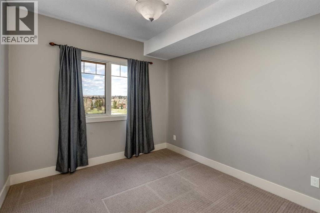 213, 77 George Fox Trail W — photo 15