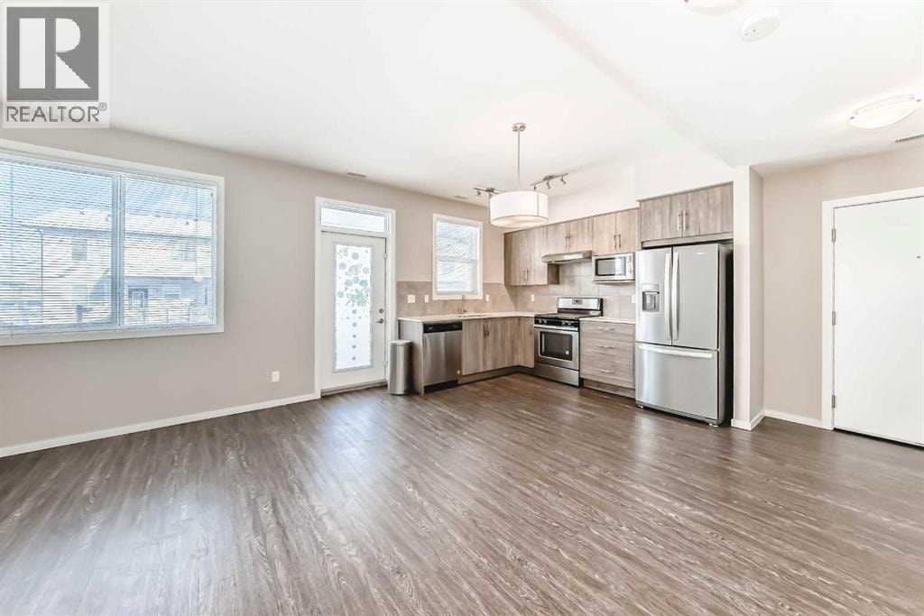 204, 135 Redstone Walk NE — photo 13