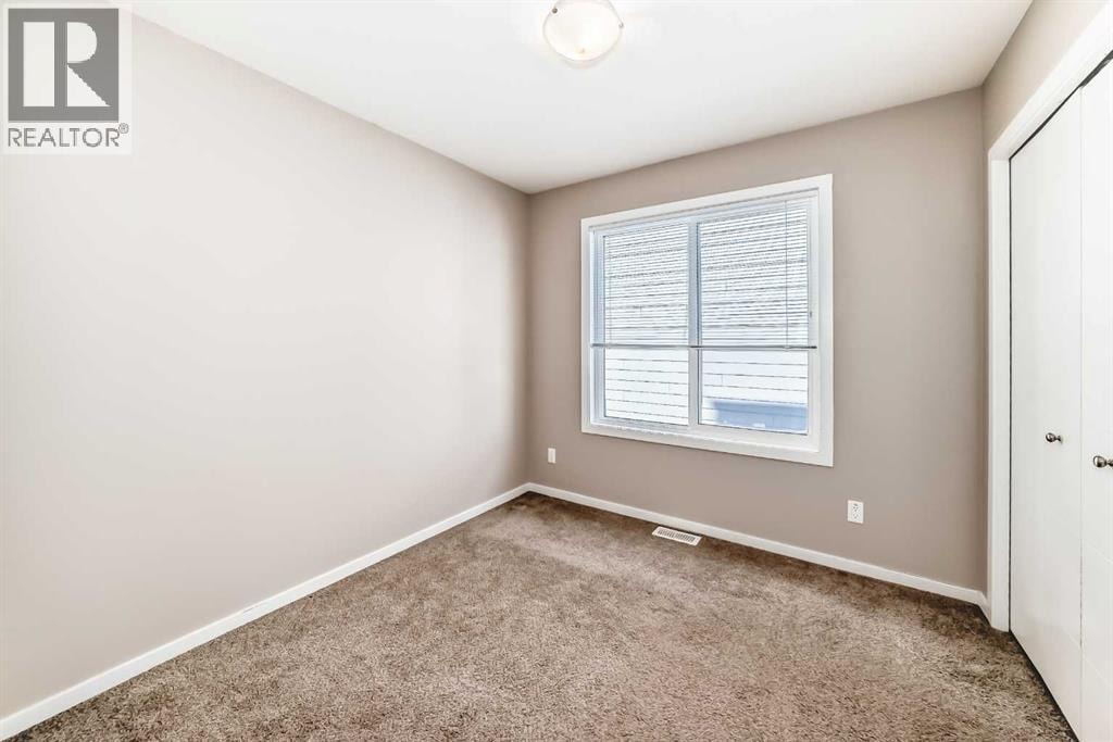 204, 135 Redstone Walk NE — photo 26