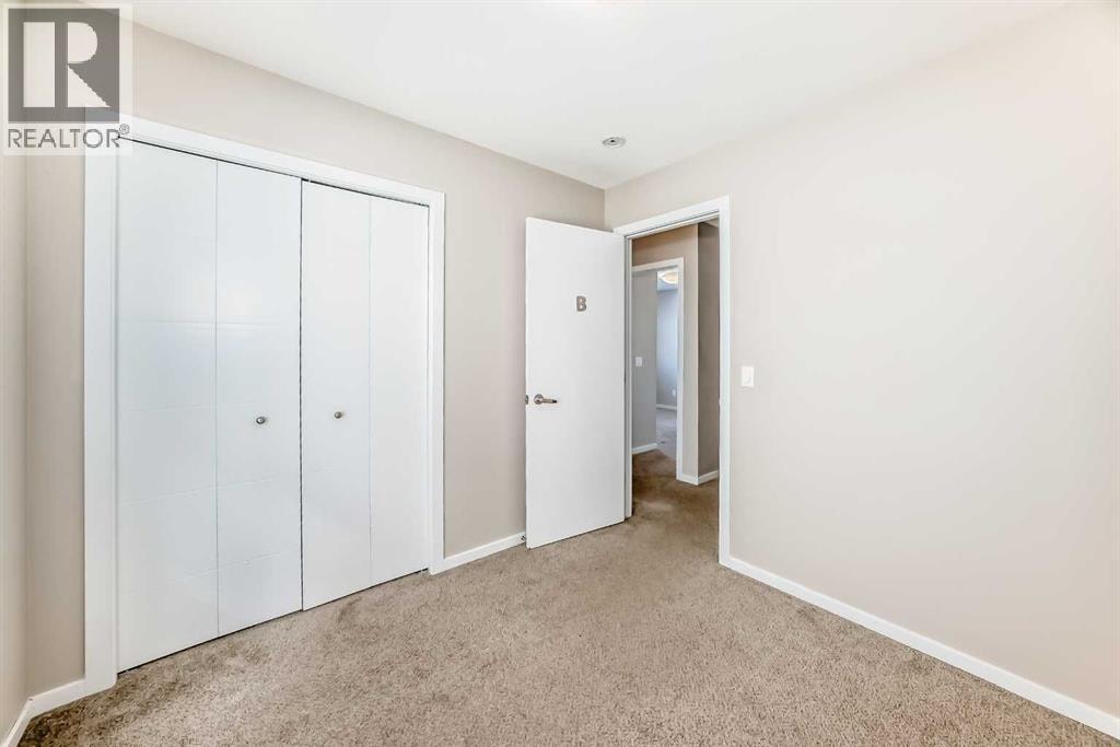 204, 135 Redstone Walk NE — photo 27