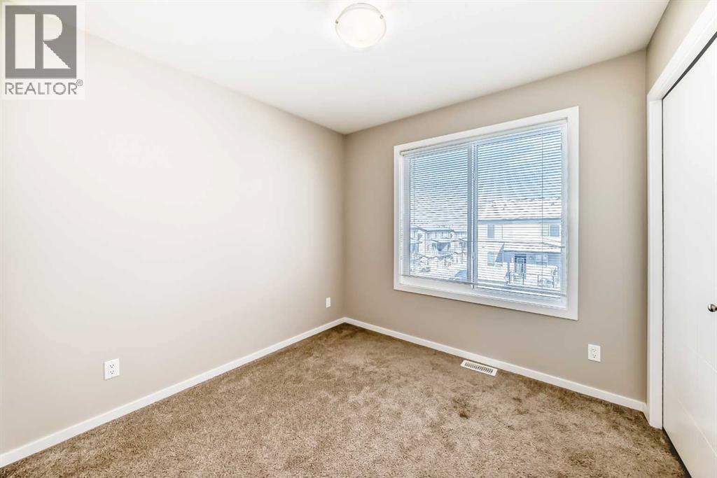 204, 135 Redstone Walk NE — photo 28