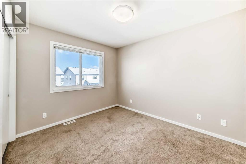 204, 135 Redstone Walk NE — photo 22