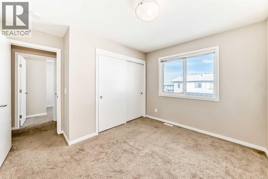 204, 135 Redstone Walk NE — photo 23