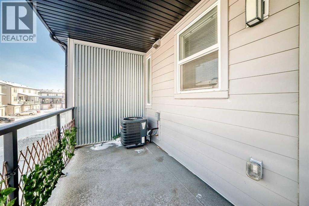 204, 135 Redstone Walk NE — photo 16