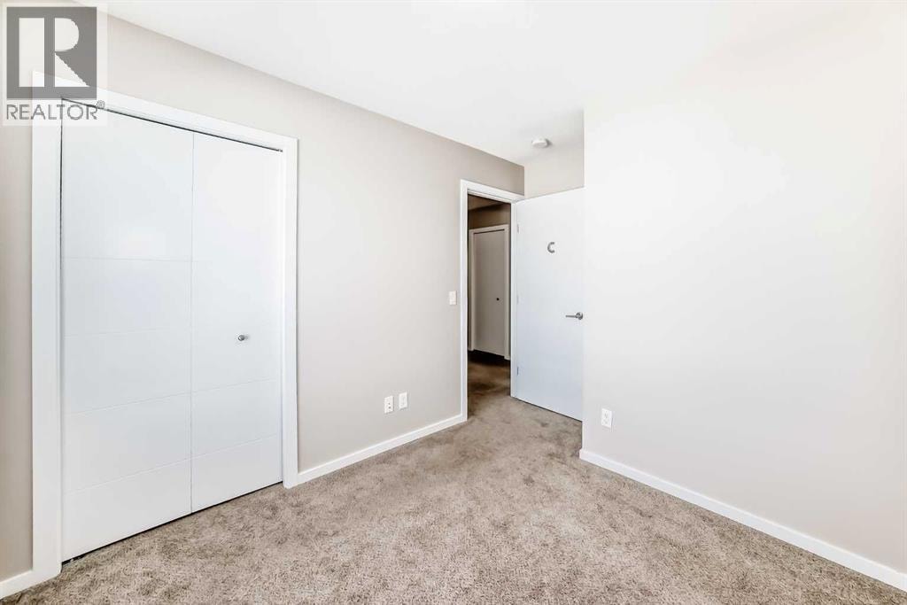 204, 135 Redstone Walk NE — photo 29