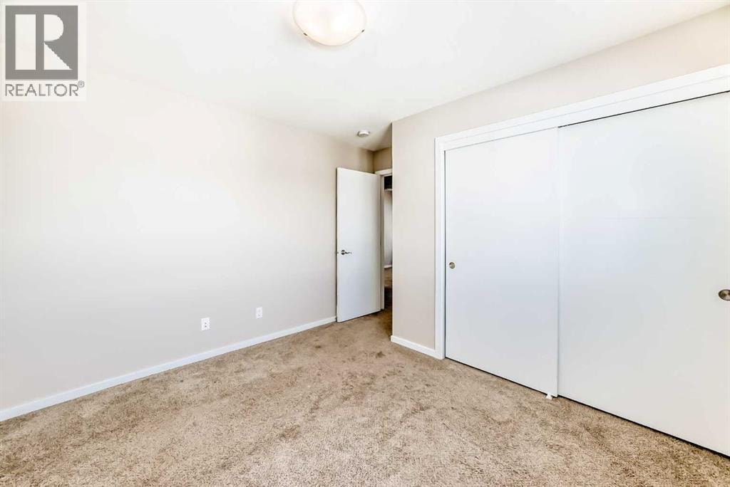 204, 135 Redstone Walk NE — photo 24