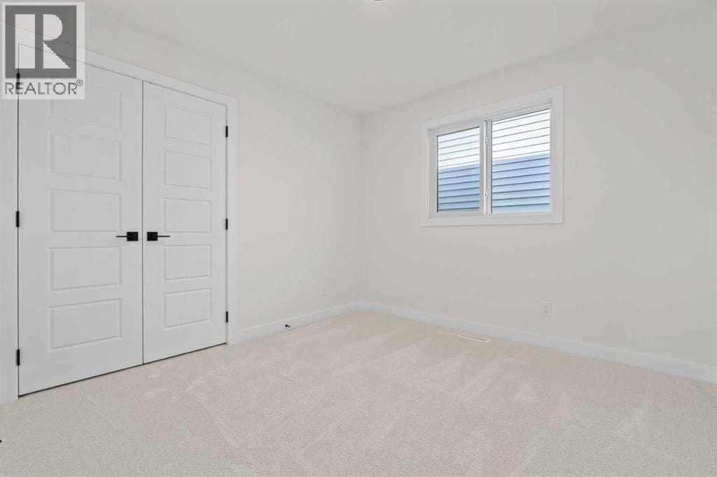 571 Buffaloberry Manor SE — photo 29