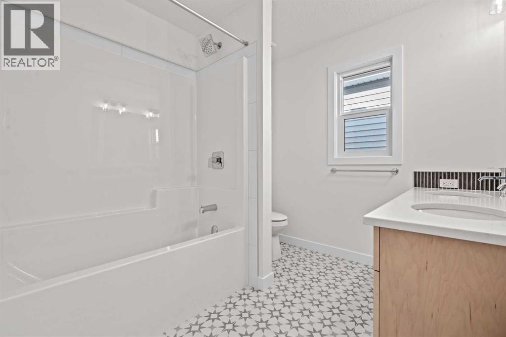 571 Buffaloberry Manor SE — photo 31
