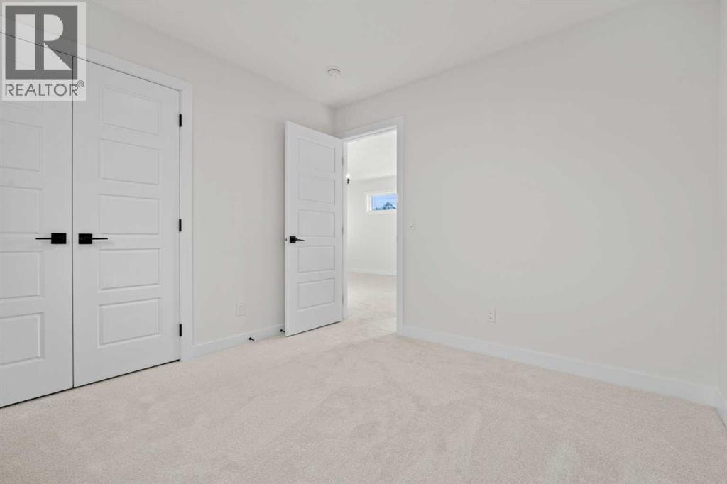 571 Buffaloberry Manor SE — photo 28