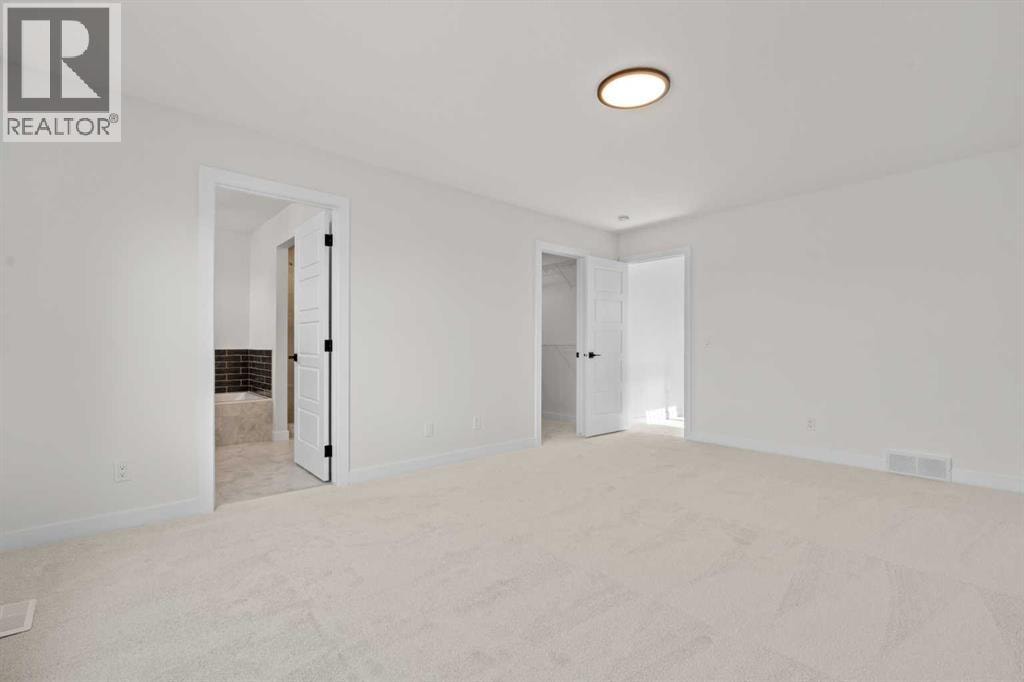 571 Buffaloberry Manor SE — photo 23