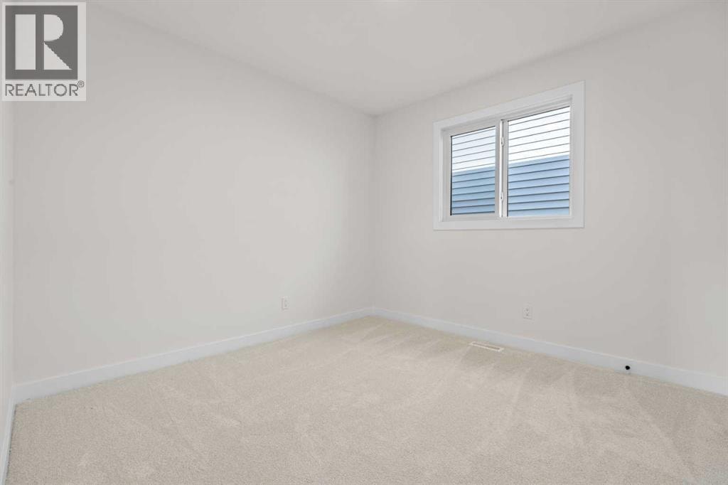 571 Buffaloberry Manor SE — photo 27