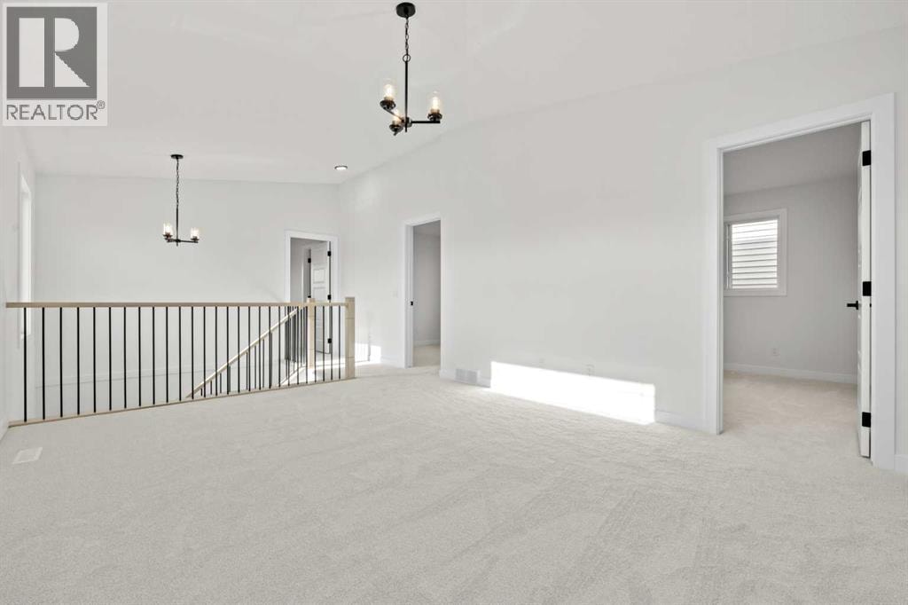 571 Buffaloberry Manor SE — photo 18