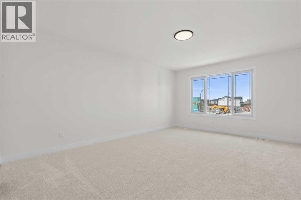 571 Buffaloberry Manor SE — photo 22