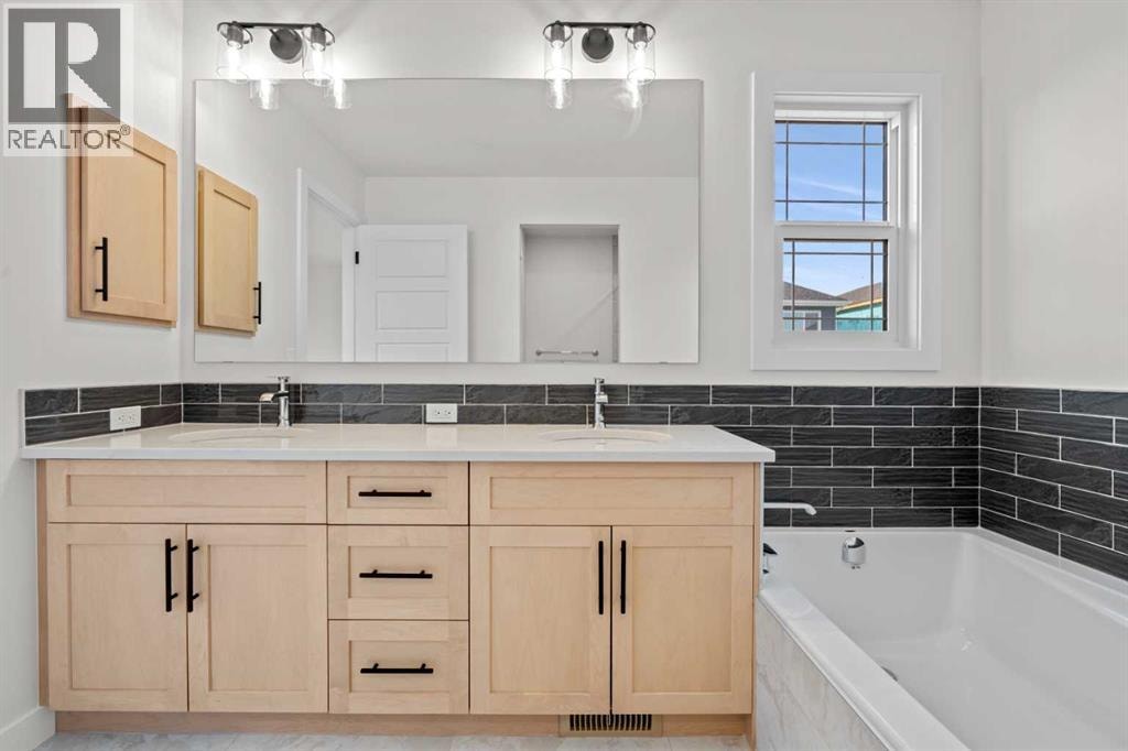 571 Buffaloberry Manor SE — photo 25
