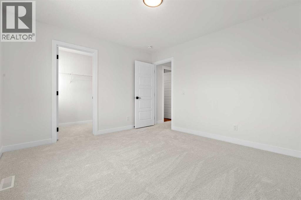 571 Buffaloberry Manor SE — photo 30