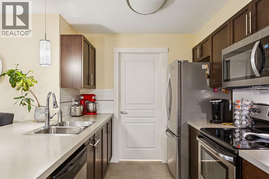 208, 2300 Evanston Square NW — photo 16