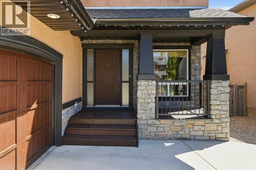 23 Aspen Stone Crescent SW — photo 2